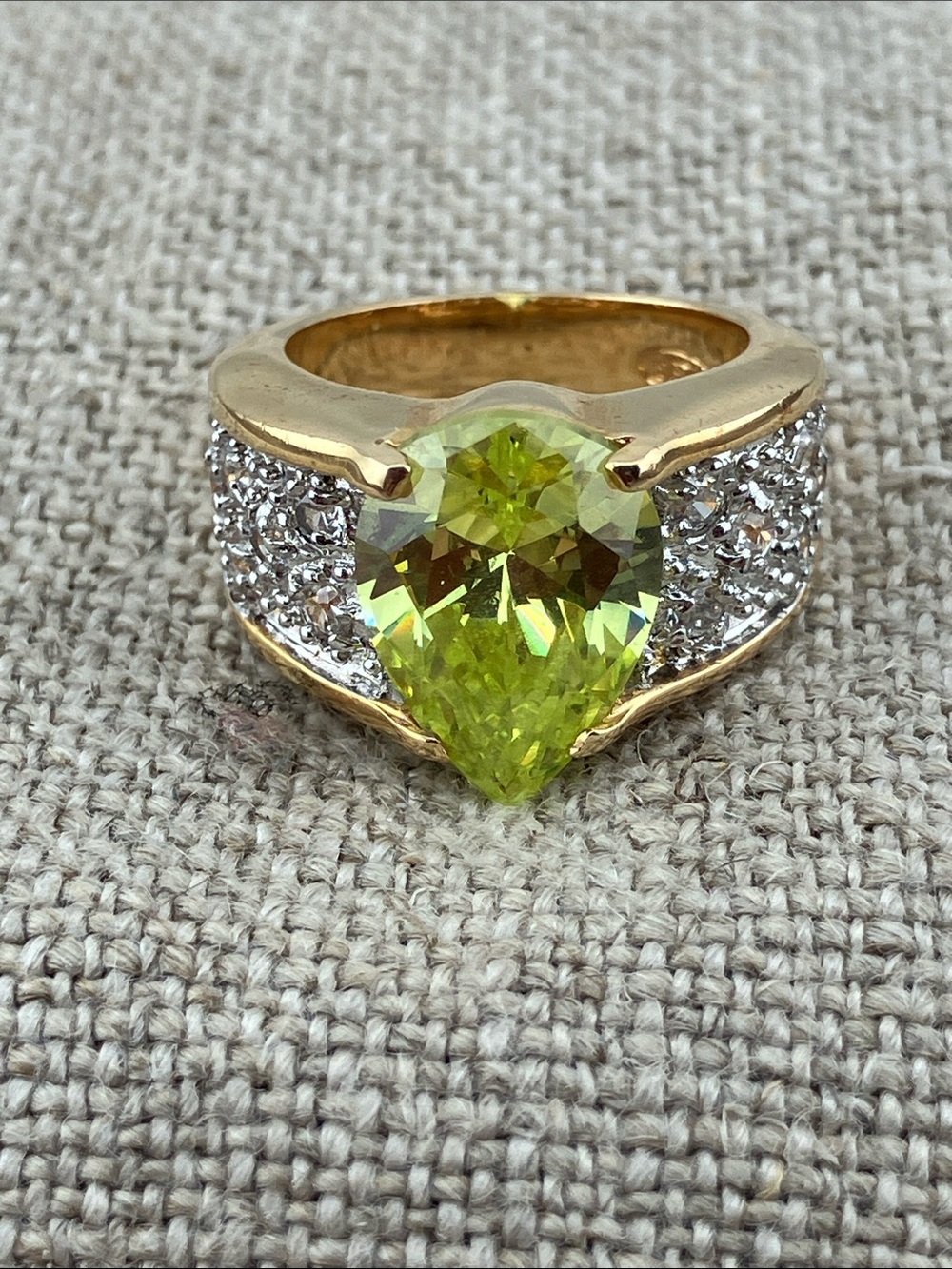 Gold plated Ring with Pear-Cut Lime Green Center and Pavé Clear Accents
